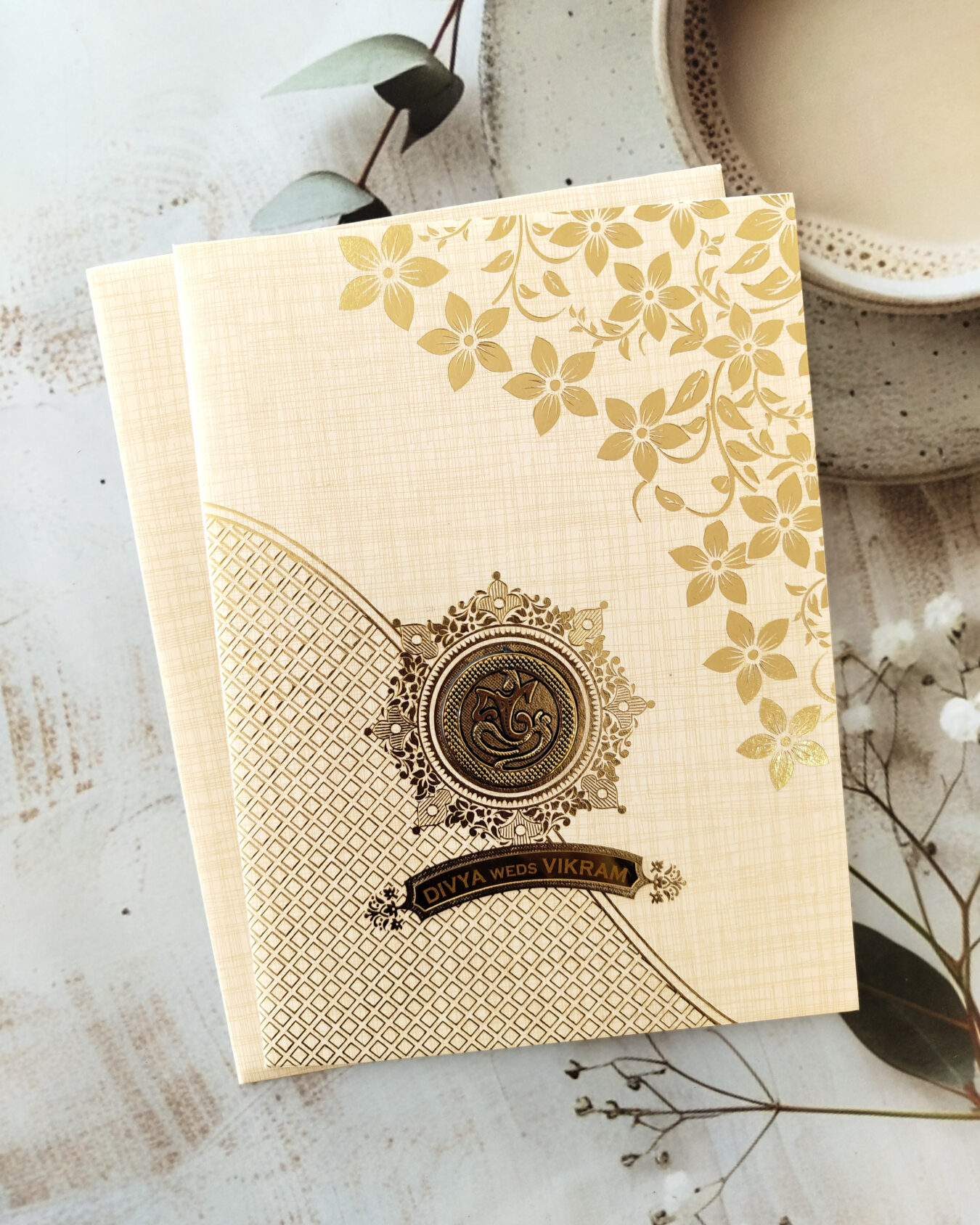 Light Cream Gold-Foiled Floral Wedding Invitation Card with Acrylic Nameplate & Matching Envelope – Customizable Emblem