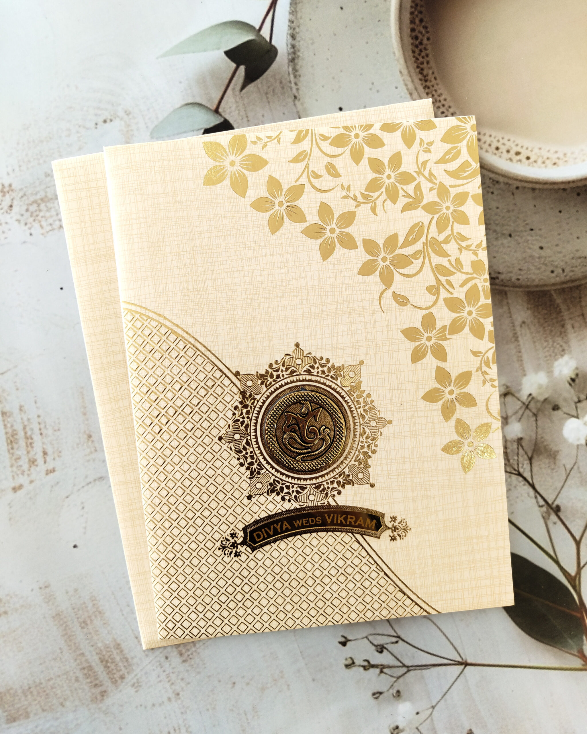 Light Cream Gold-Foiled Floral Wedding Invitation Card with Acrylic Nameplate & Matching Envelope – Customizable Emblem