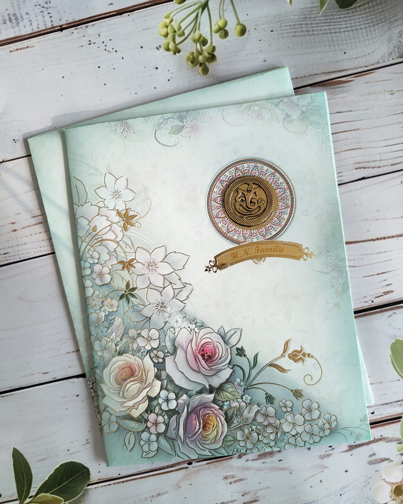 Pista Green Floral Wedding Card with Acrylic Nameplate & Matching Floral Envelope | Customisable Emblem