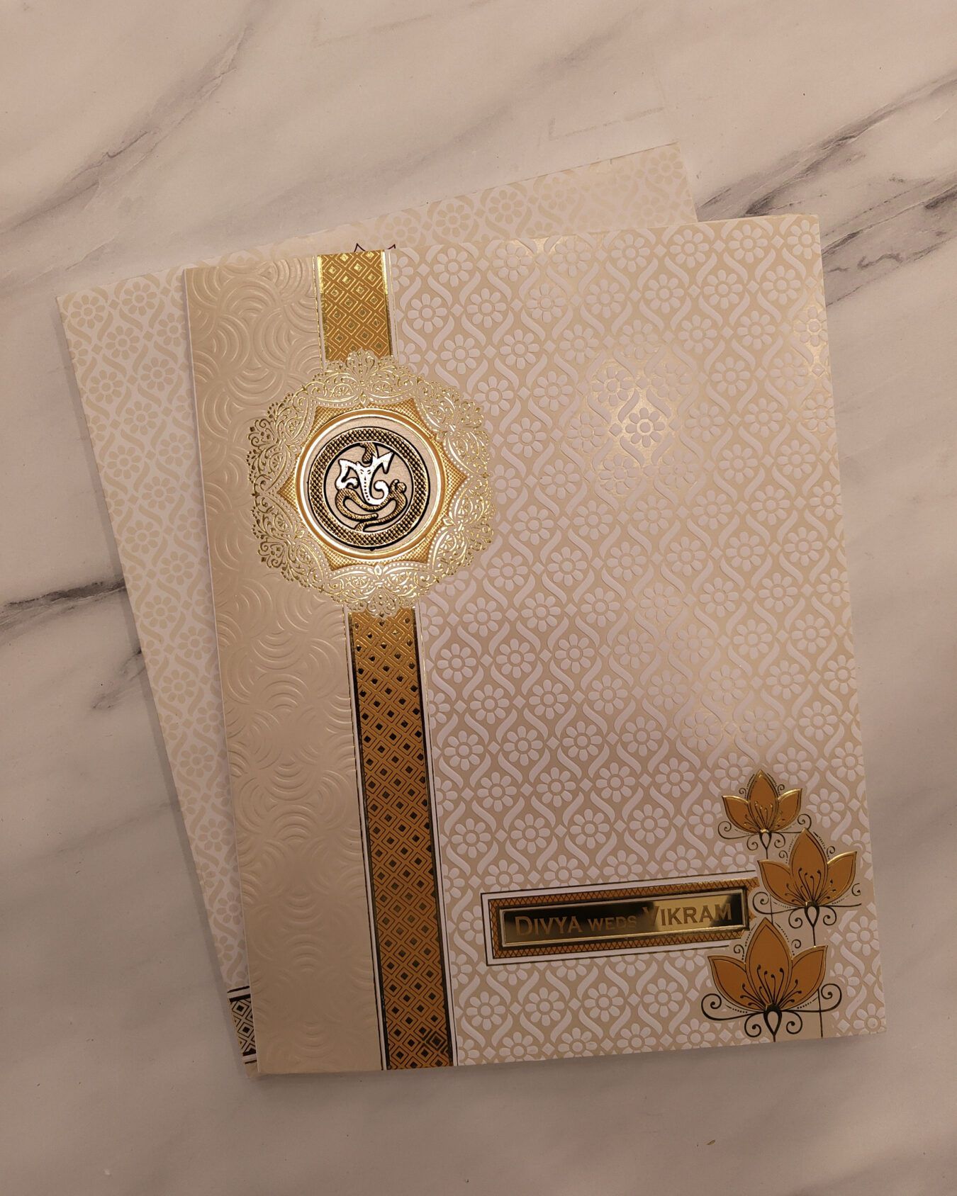 Cream & Gold Embossed Wedding Invitation Card with Acrylic Nameplate & Customisable Emblem | Premium Matching Envelope