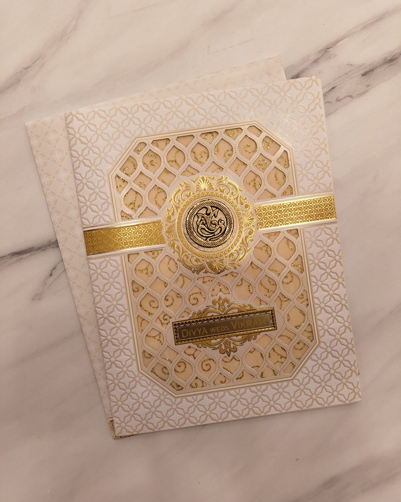 Gold Sandal Die Cut Metallic Wedding Invitation Card with Acrylic Nameplate & Customisable Emblem | Matching Envelope